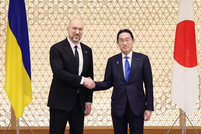 Prime Minister Kishida Fumio, right, and Prime Minister Denys Shmyhal, left, agreed to progress Ukra...