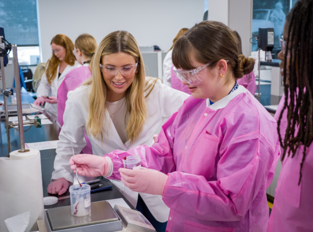 Students from Lewisville High School – Harmon Campus (Texas, U.S.A.) putting their knowledge to the test by creating their own Mary Kay® Unlimited Lip Gloss at Mary Kay&#039;s global Richard R. Rogers Manufacturing and Research & Development Center (Photo Credit: Mary Kay Inc.)