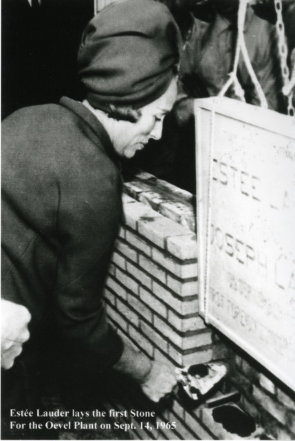 Estée Lauder lays the first stone for The Estée Lauder Companies’ Oevel, Belgium facility in 1965