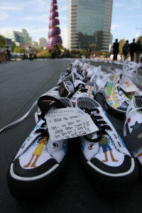 Canvas shoes carrying messages of hope drawn by Ko