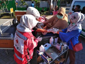 PMI members were binding a wound of an earthquake 
