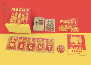 코미웍스가 퍼블리싱하는 보드게임 ‘MACHT’와 주요 구성품. 프론트 포커스의 오리지널 세계관을 기반으로 제작됐다(사진 제공=코미웍스)